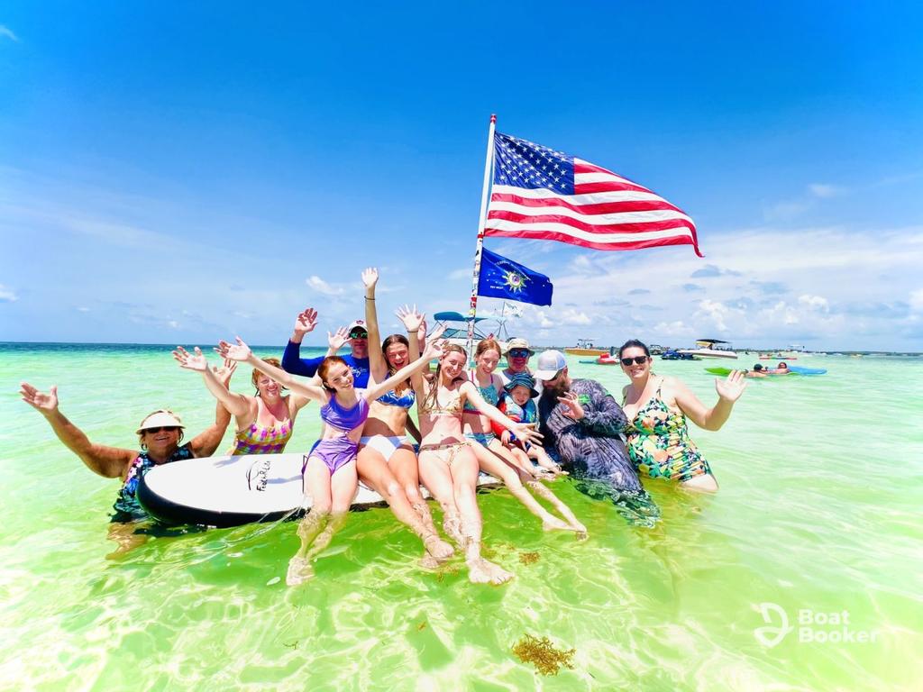 Passengers enjoying a charter boat on turquoise Florida waters