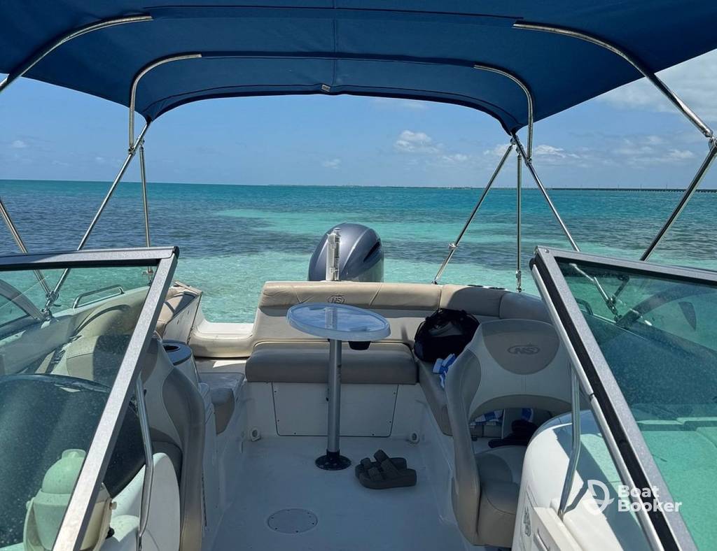 Charter boat on calm Florida waterway with passengers aboard