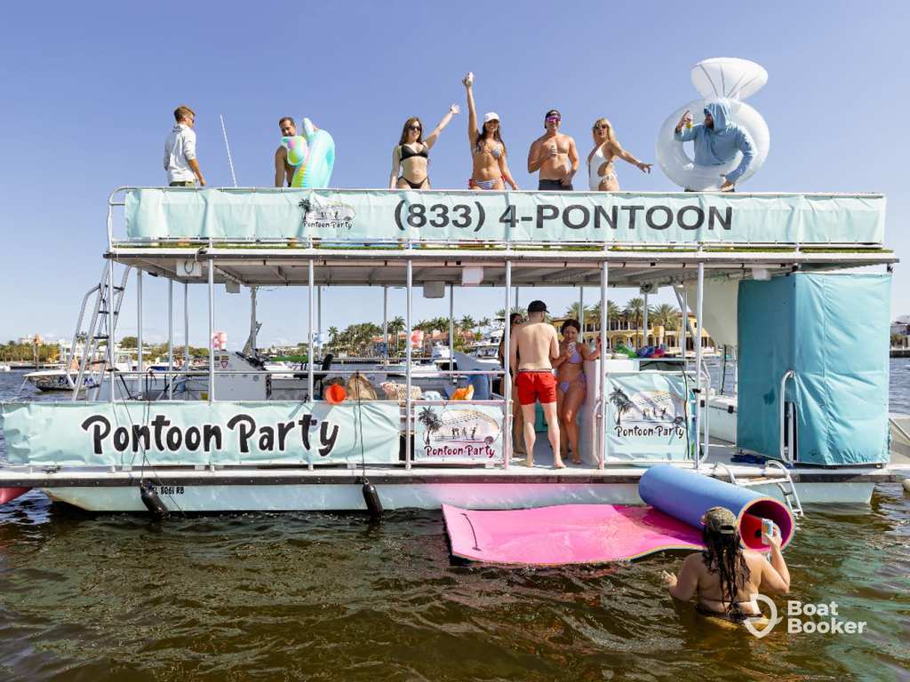 Double-deck pontoon boat ready for a day trip with passengers