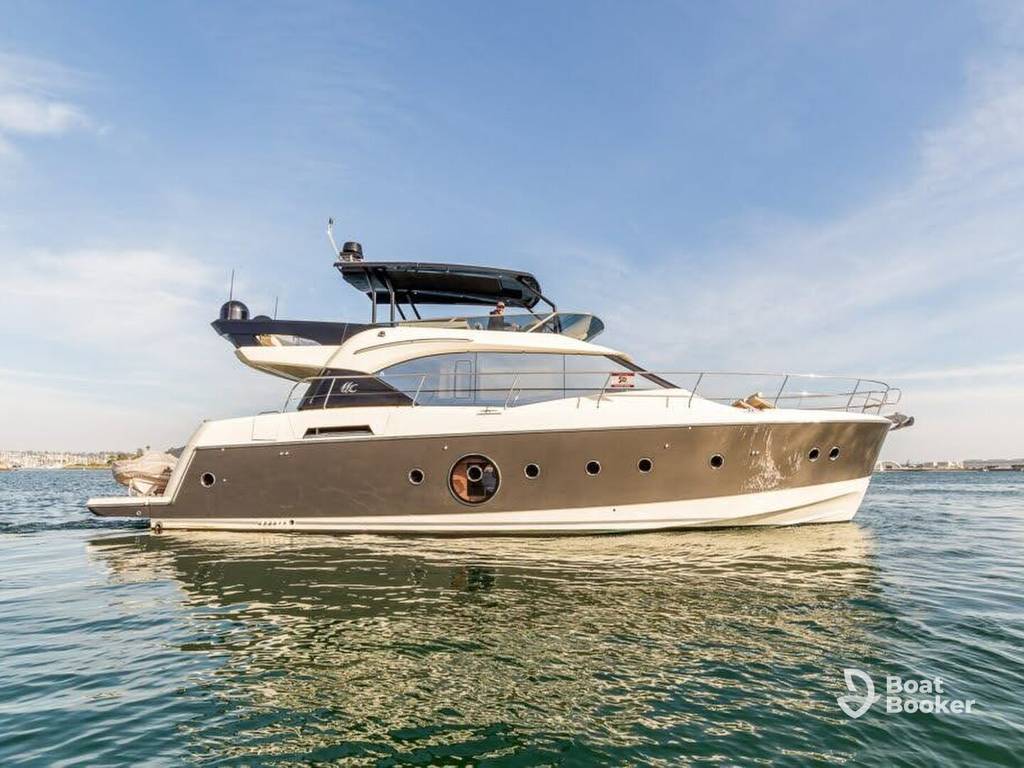 Luxury motor yacht cruising along the California coastline